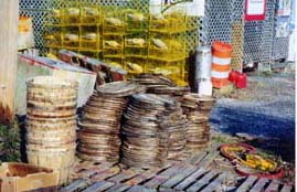 [photo, Crab baskets, tops, & yellow crab pots (traps), Chesapeake Beach, Maryland]