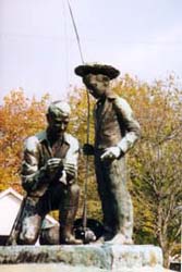 [photo, Fisherman and Boy statue, outside Town Offices, 10 Frederick Road, Thurmont, Maryland]